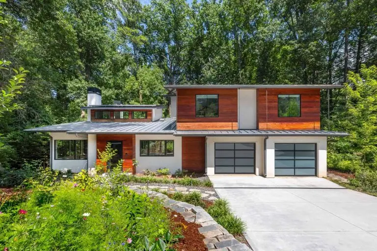 Decatur modern custom home exterior with wood siding and metal roof