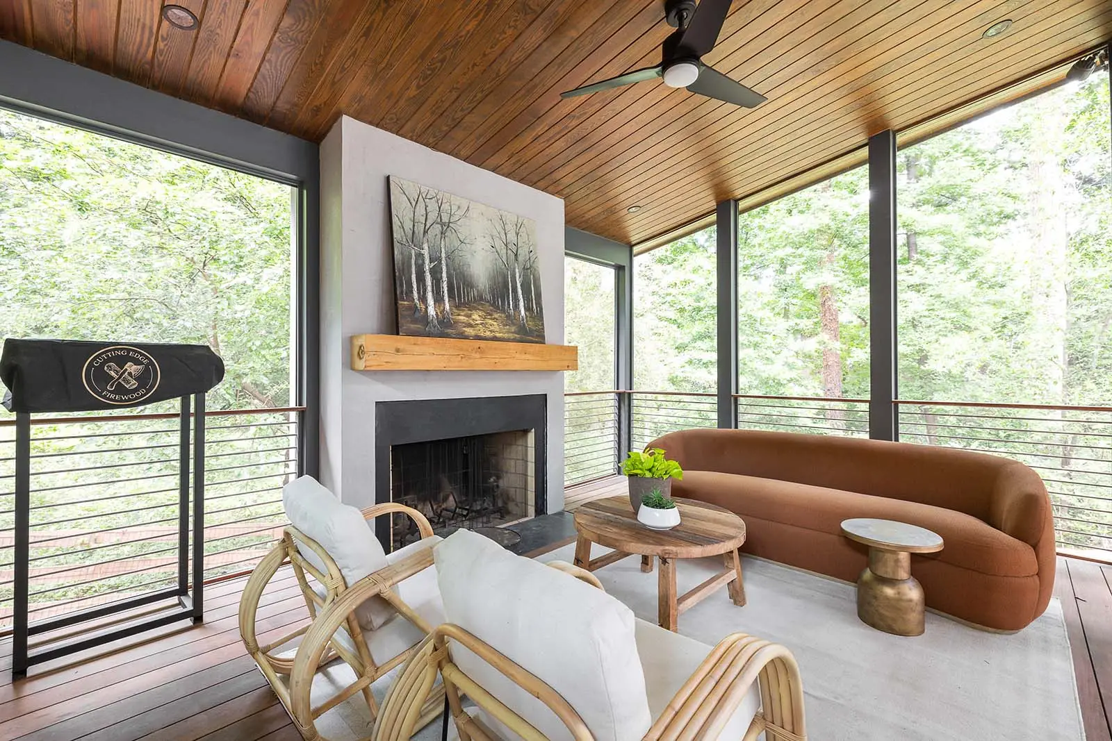 Screened porch with fireplace at Decatur modern custom home