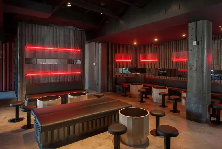 Little Trouble restaurant lounge with red neon lighting in West Midtown Atlanta