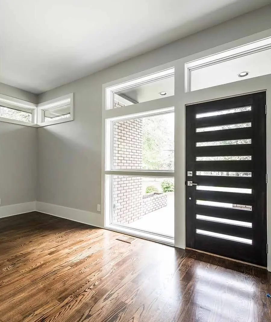 Modern front entry at Oakhurst custom home in Decatur